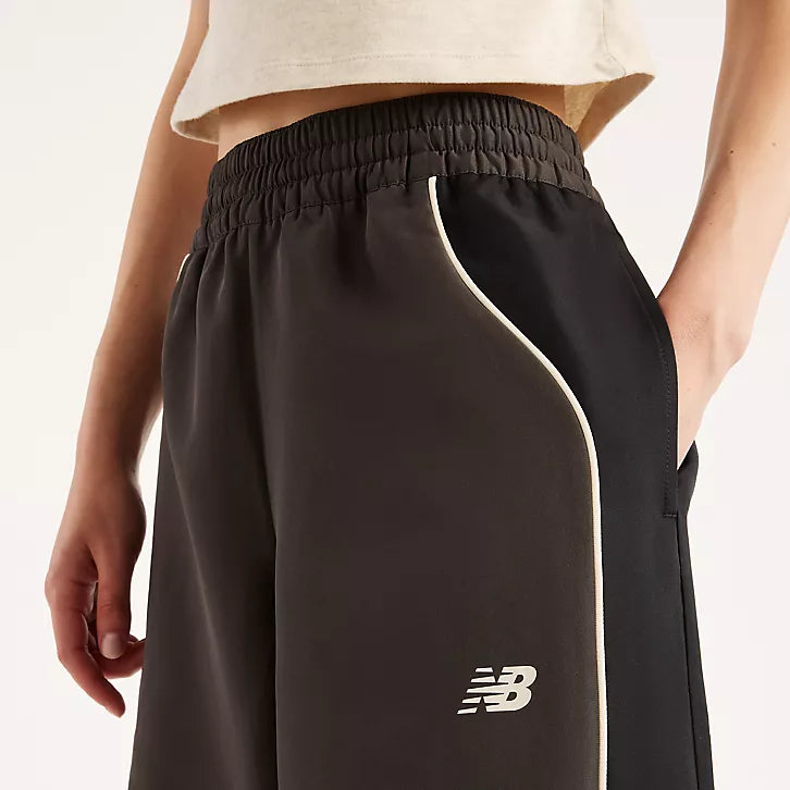 NEW BALANCE WOVEN TRACKSIDE PANT